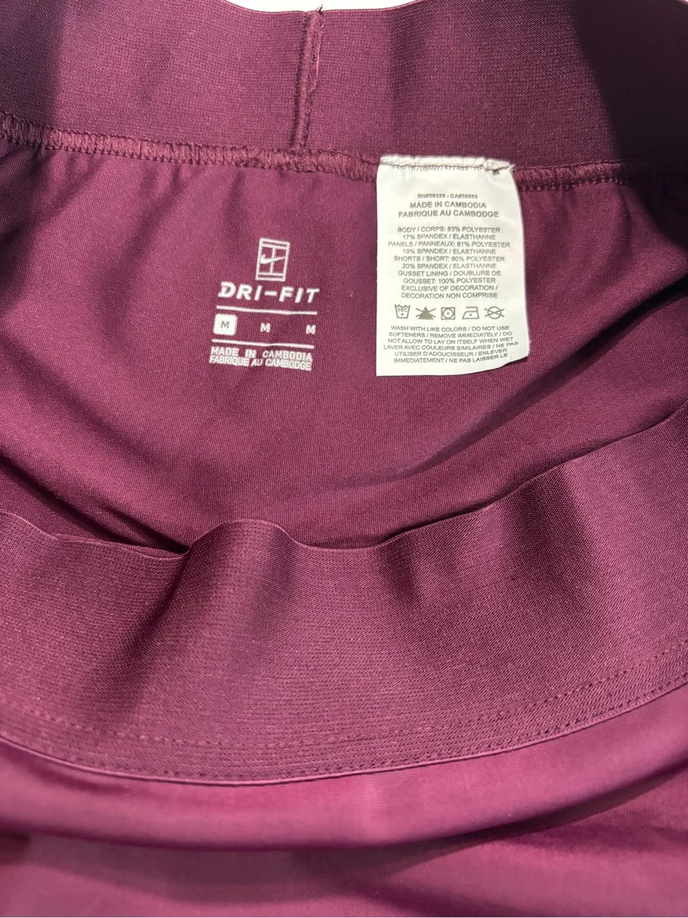 Nike Women's Plum Athletic Skater Skort with White Swoosh Accent